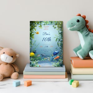 Bright and colorful aquarium birthday invitation featuring vibrant fish, lush aquatic plants, and a clear central space for adding party details, perfect for kids’ under the sea themed birthday parties, editable in Canva and printable.