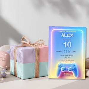 Arcade birthday invitation displayed beside a wrapped gift box, neon gamer party invite template