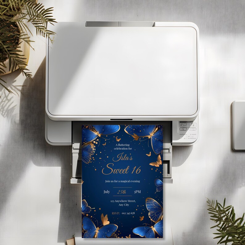 Printed royal blue butterfly Sweet 16 invitation on a table with envelope