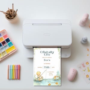Printed Ofishally One birthday invitation coming out of a printer, watercolor first birthday fishing party invite with matching thank you card