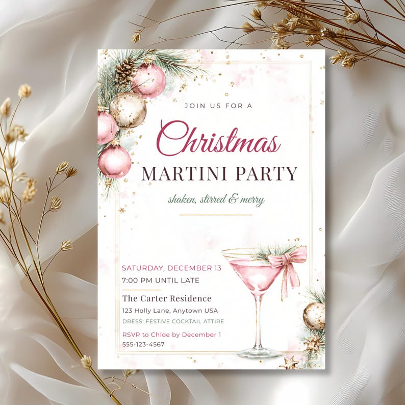 Blush pink and gold Christmas martini party invitation on ivory satin with dried golden stems.