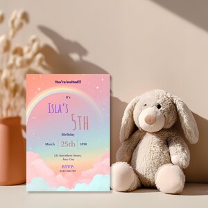 Rainbow cloud birthday invitation for girls styled with a plush bunny