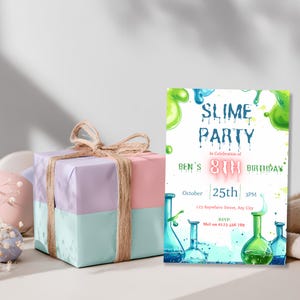 Slime party invitation displayed next to a wrapped birthday gift, editable mad scientist invite for a boy's birthday