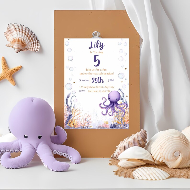 May include: A lilac octopus soft toy beside a birthday invitation. The invitation reads "Lily is turning 5" with the date October 25th, and features an octopus illustration. Seashells and a starfish are also in the image.