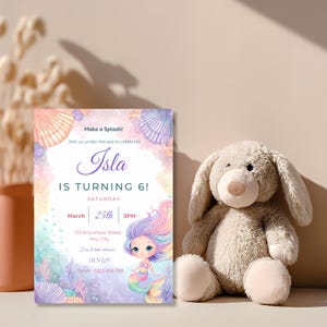 Kids mermaid party invitation standing beside a soft plush bunny, with pastel watercolor seashells, coral and bubbles.