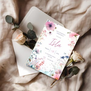 Editable bridal shower invitation template and envelope styled with eucalyptus and a cream rose on soft neutral fabric.
