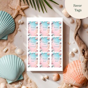 May include: A sheet of favor tags with a beach theme. Each tag has a watercolor design with seashells, starfish, and the text "Thank You!" or "Thanks for Coming!". The tags are surrounded by seashells, sand, and a blue seashell.