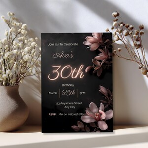 Elegant black and blush 30th birthday invitation card styled beside a vase of dried flowers, dark floral editable template