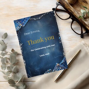 May include: A thank you card with a denim-like background and the words "Thank you" in gold. The card is decorated with faux jewels and denim accents. The text reads "Dear Emma, Thank you, For Celebrating with me! Love, Mel!"