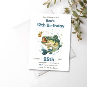 Alt: Editable fishing birthday invitation card with a matching envelope on a white background, leaves in the corner
