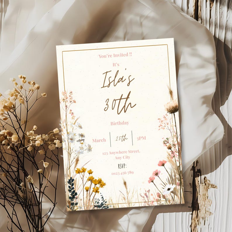 May include: A cream-colored invitation with a gold border, featuring floral illustrations and the text "You're Invited!! It's Isla's 30th Birthday March 25th 3PM". Includes address and RSVP information. Decorative floral elements.