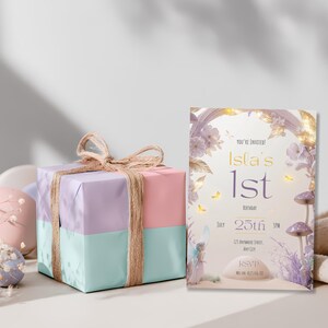 Fairy first birthday invitation Canva template displayed beside pastel wrapped birthday gift with ribbon showing purple lavender mushroom fairy design perfect for girls first birthday party