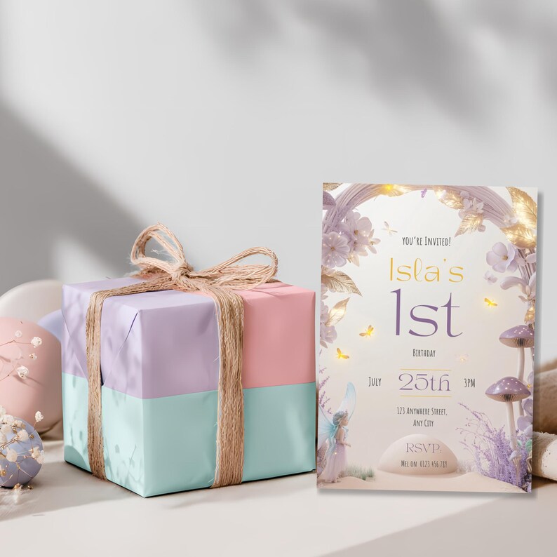 Fairy first birthday invitation Canva template displayed beside pastel wrapped birthday gift with ribbon showing purple lavender mushroom fairy design perfect for girls first birthday party