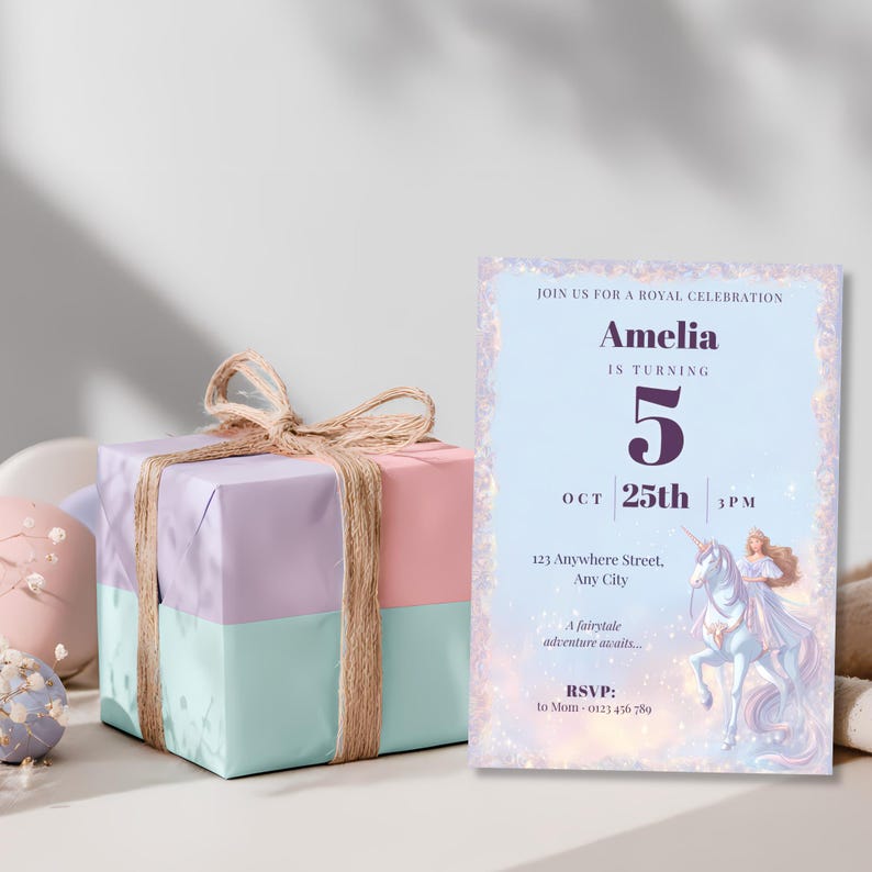 Princess unicorn birthday invitation standing next to a pastel lilac, pink and mint wrapped gift box
