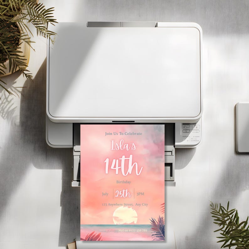 May include: A white printer printing a birthday invitation. The invitation has a pink and orange sunset design with the text "Isla's 14th Birthday" and the date "July 25th".