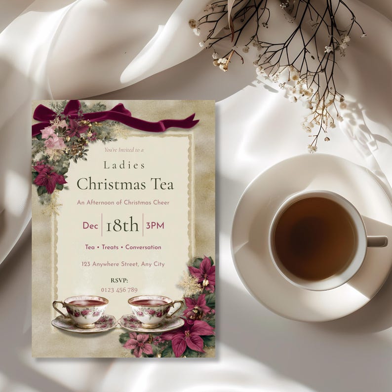 Ladies Christmas Tea Party invitation displayed beside a cup of tea for a cozy holiday tea table