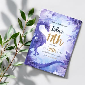 Editable purple dragon party invitation with gold 17th and navy script, watercolor fantasy birthday card beside green leaves and soft shadows