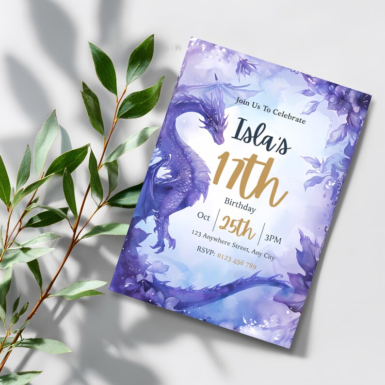 Editable purple dragon party invitation with gold 17th and navy script, watercolor fantasy birthday card beside green leaves and soft shadows