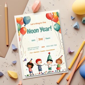 Kids Noon Year countdown party invite on a craft table with colored pencils, envelope and paper confetti