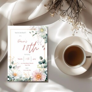 Elegant 80th birthday invitation with pastel floral botanical theme, editable Canva template for milestone birthday celebration