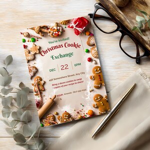 Printed Christmas cookie exchange invitation on a whitewashed wood table with glasses, a pen and eucalyptus, with “bring 3 dozen cookies to swap” rules