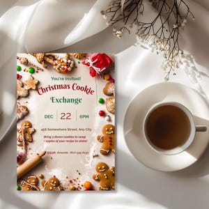 Holiday cookie swap invitation beside a cup of coffee on soft white satin, a printable Christmas baking party invite
