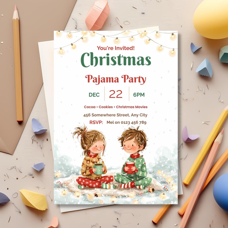 Printed Christmas pajama party invitation on an envelope with colored pencils and paper shapes, a printable 5x7 kids party invite