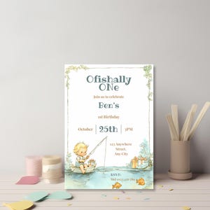 Full view of Ofishally One first birthday invitation with watercolor child fishing illustration and editable party information