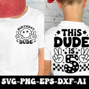 May include: White t-shirt with a black graphic on the front that says "BIRTHDAY DUDE" with a smiley face and peace signs. The back of the shirt says "THIS DUDE is 5" with peace signs and a checkered pattern.