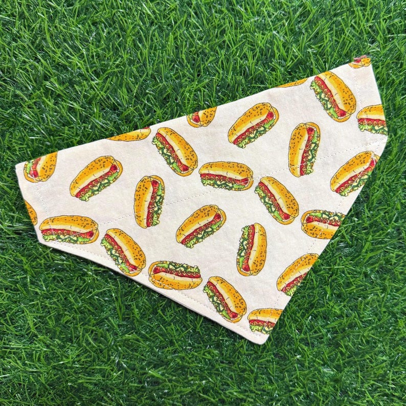 This over the collar dog bandana features Chicago-style hotdogs on cream cotton background
