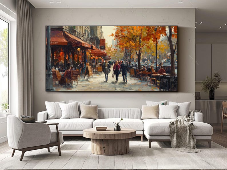 May include: A painting of a Parisian street scene with people walking past a cafe with red awnings. The trees are in autumn colors and the sky is a light blue.