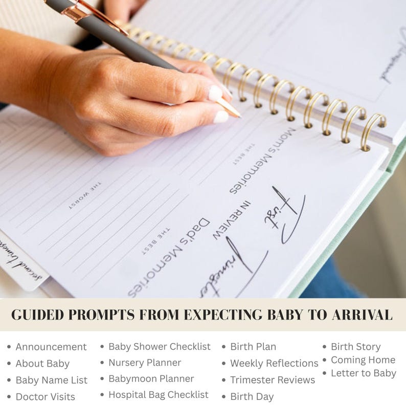 May include: A spiral-bound pregnancy journal with white pages featuring printed prompts including First Trimester, Mom's Memories, and Dad's Memories. The journal has gold-tone wire binding and is being written in with a dark grey and gold pen.