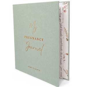 May include: A sage green pregnancy journal with gold foil text that reads My Pregnancy Journal and Bump to Birth. The book features side tabs labelled Expecting you, first trimester, second trimester, third trimester, and your arrival, with floral patterns.