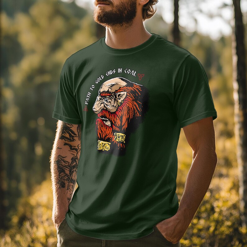 May include: A green t-shirt with a cartoon illustration of a dwarf with a red beard and the text "Path to gold ends in coal".