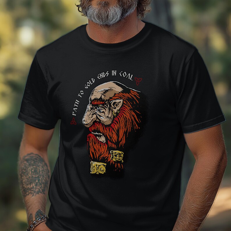 May include: Black t-shirt with a cartoon illustration of a dwarf with a red beard and the text "Path to gold ends in coal".