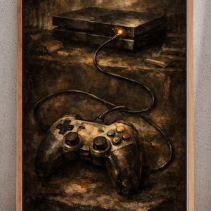 Könnte beinhalten: Gerahmtes Gemälde einer Spielkonsole und eines Controllers. Die Konsole ist dunkel, rechteckig und über ein schwarzes Kabel mit dem Controller verbunden. Der Controller hat farbige Tasten und ein abgenutztes Aussehen, was auf die Nutzung hindeutet.