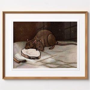 May include: A framed print featuring a brown rat with two heads, lying near a piece of bread. The artwork has a cartoonish style with a brown and white color palette. The print is in a wooden frame.