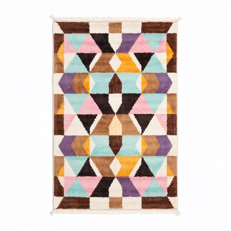 Handmade colorful wool rug featuring a bold geometric pattern with pastel pinks, blues, yellows, and earth tones. Crafted with high-quality hand-knotted wool, this modern Art Deco-inspired rug brings vibrant energy and artistic flair to living rooms, bedrooms, or creative interiors. Plush, durable, and visually striking, it creates a cozy yet dynamic atmosphere in any contemporary or eclectic space.