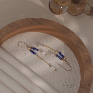 セレスティアル シンフォニー フック イヤリング | 5x6.5 mm オーバル 淡水パール | 14K ゴールドフィルド | ホリデー ギフト | 女性へのギフト | 米国製