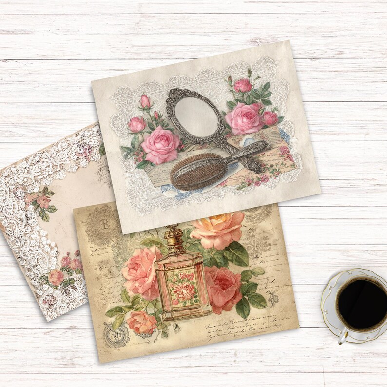 Op de afbeelding: Drie rechthoekige vellen papier met illustraties in vintage-stijl. E&eacute;n vel toont een handspiegel en haarborstel met roze rozen. Een ander toont een parfumflesje omringd door rozen. Het derde vel is voorzien van witte kanten randen en rozen.