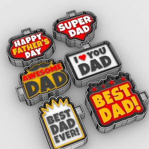 May include: Six colorful Father's Day signs with different messages. The signs are made of cardboard and have a 3D effect. The messages include "Happy Father's Day", "Super Dad", "Awesome Dad", "I Love You Dad", "Best Dad Ever!" and "Best Dad!"