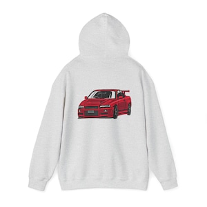 May include: A grey hooded sweatshirt with a red car graphic on the back. The car is a Japanese sports car with a spoiler.