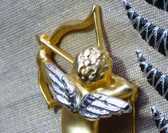 Expressive Brushed Gold Tone Angel Cherub Cupid with Silver Wings Pin Brooch Hat Label Vintage 1990s Costume Jewelry