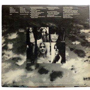 Two 1970s Vinyl Lps Aerosmith Featuring Dream On Columbia Jc32005 And Two 1970s Vinyl Lps Aerosmith Featuring Dream On Columbia Jc32005 And