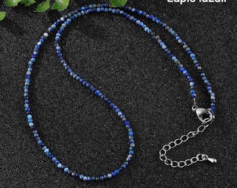 Halsband av turmalin, apatit, lapis lazuli, pyrit, jordgubbskvarts, tigeröga och obsidian.