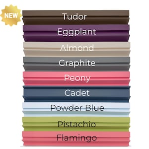May include: A color palette featuring ten different paint colors, including Tudor, Eggplant, Almond, Graphite, Peony, Cadet, Powder Blue, Pistachio, and Flamingo. The word "NEW" is in a gold starburst.