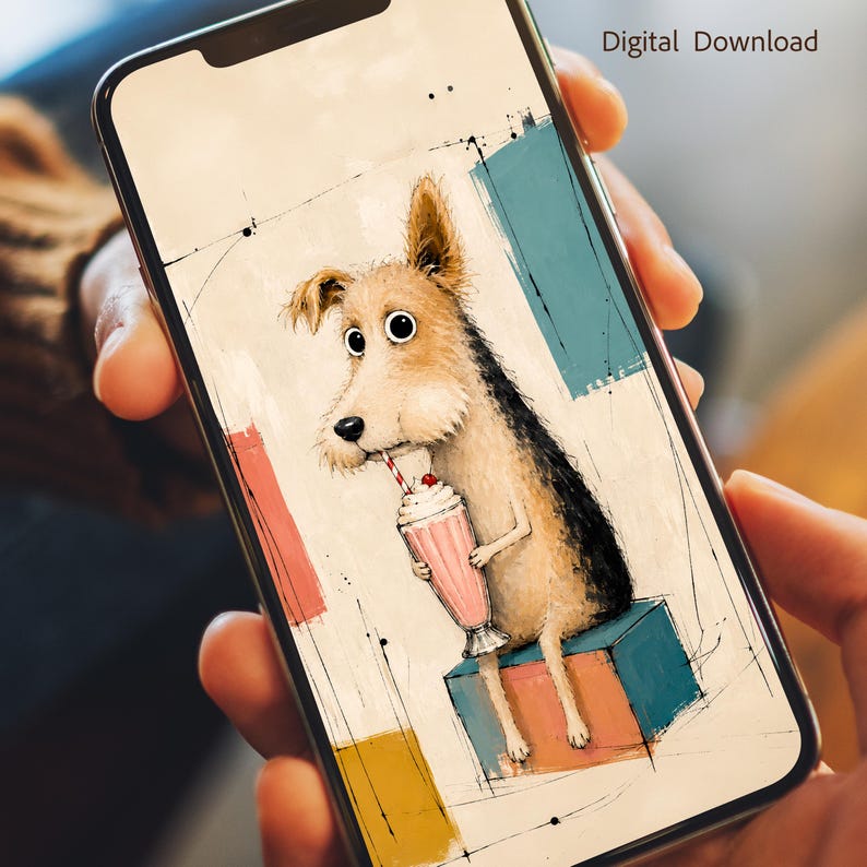 K&ouml;nnte beinhalten: Ein Smartphone-Bildschirm mit einer digitalen Illustration eines beigen und schwarzen Hundes, der auf einem blauen und orangefarbenen Block sitzt und einen rosa Milchshake mit einem rot-wei&szlig; gestreiften Strohhalm h&auml;lt. Digital Download steht oben.