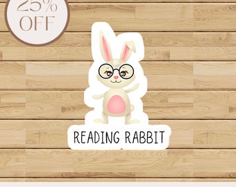 May include: A sticker featuring a cartoon rabbit wearing glasses, with the text "READING RABBIT". The rabbit has a pink belly and ears. A circular label reads "25% OFF". The bottom text reads "AVAILABLE IN FOUR SIZES".