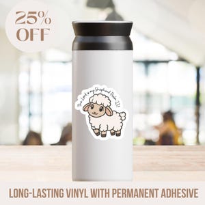 May include: White insulated travel mug with a black lid, featuring a sticker of a cartoon sheep with the text "The Lord is my Shepherd Psalm 23:1". The text "25% OFF" is in the upper left corner. The bottom of the mug reads "LONG-LASTING VINYL WITH PERMANENT ADHESIVE".