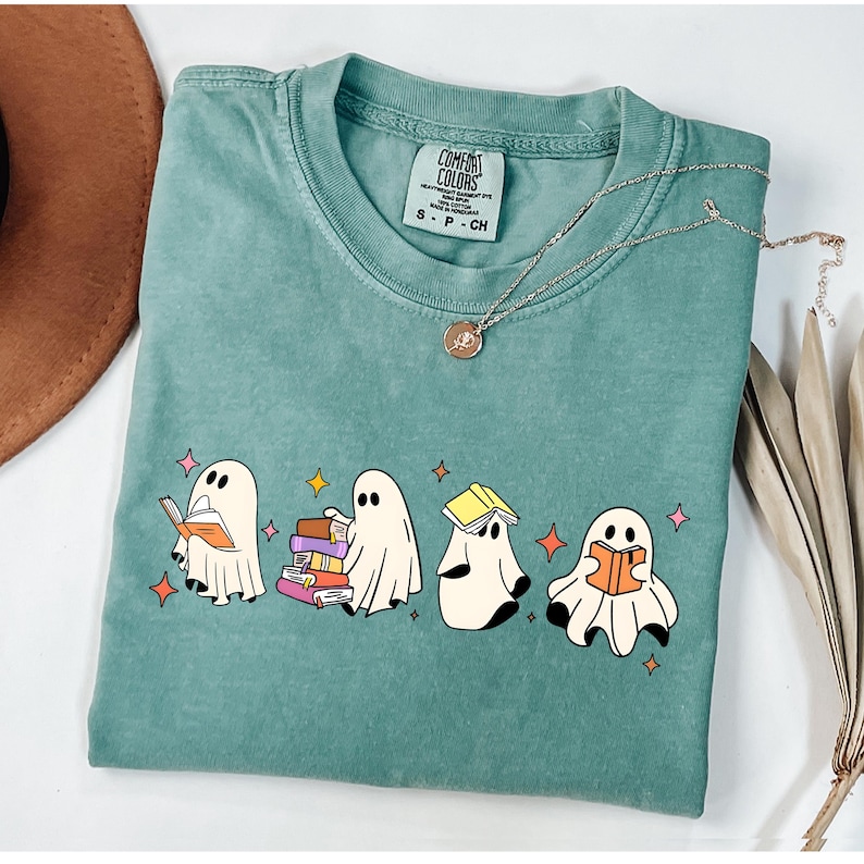 Comfort Colors® Ghost Reading Books Shirt, Bookish Halloween Shirt, Teacher Librarian Halloween Gift, Halloween Book Lover, Halloween School Cute Ghost Reading Book Halloween Tshirt, Ghost Reading Book Girly Shirt, Ghost Girly Halloween Gift, Trendy Halloween Gift